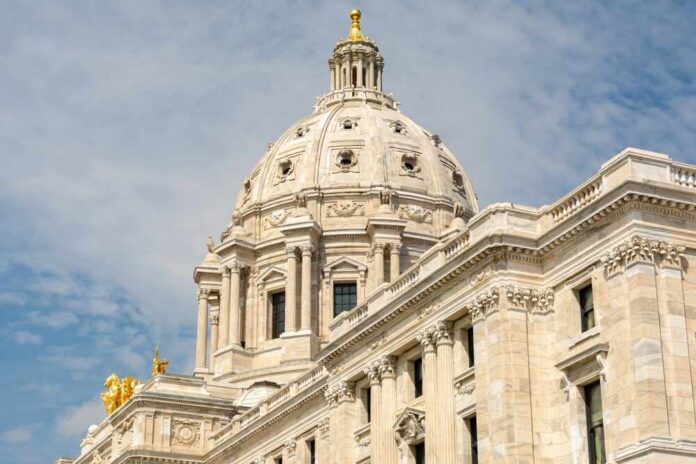 Exterior,Of,The,Minnesota,State,Capitol,Building,,Built,Between,1896 A speaker at a political rally smiling while addressing the audience