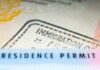 Trump Tightens Student Visa Rules Residence permit document with immigration stamp
