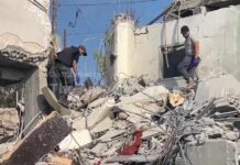 Aftermath of deadly Israeli strike on south Lebanon's Deir Zahrani | AFP