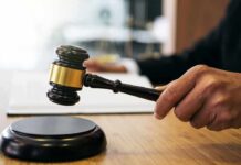 Attorney General Blasts ‘Extreme’ Family Abuse Judge's hand holding a gavel over a sound block