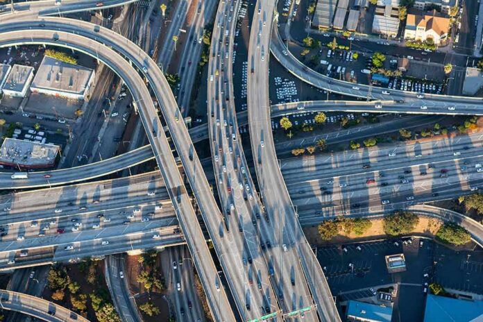shutterstock_1087864616 Aerial view of a busy multi-level highway interchange
