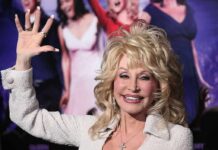 Politicized Tribute Ignites Dolly Fan Outrage blonde woman waving at a red carpet event
