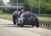 Traffic Stop Exposes Grisly Ride Police officer conducting a traffic stop on a highway