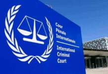 Gaza Battle Moves Into Global Courts International Criminal Court sign with scales emblem outside modern building