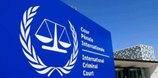 Gaza Battle Moves Into Global Courts International Criminal Court sign with scales emblem outside modern building