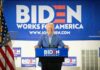 DOJ Task Force Drops Bomb On Biden’s Washington smiling man at podium during campaign event