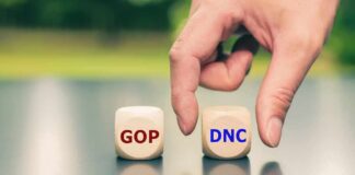 Hand choosing between GOP and DNC dice