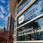 Vaccine Research Center building exterior with glass facade and signage