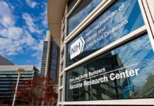 Behind Fauci’s ‘No Red Flags’ Claim Vaccine Research Center building exterior with glass facade and signage