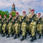 30,000 Kim Soldiers? Ukraine Sounds Alarm Soldiers in camouflage uniforms march in formation with rifles