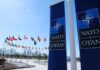 NATO flags and banners outside headquarters