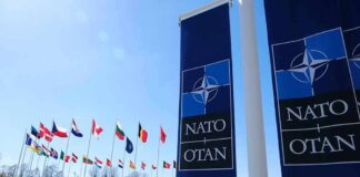 NATO flags and banners outside headquarters