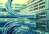 Massive Emissions Ceiling Triggers National Fight Network switches with blue Ethernet cables