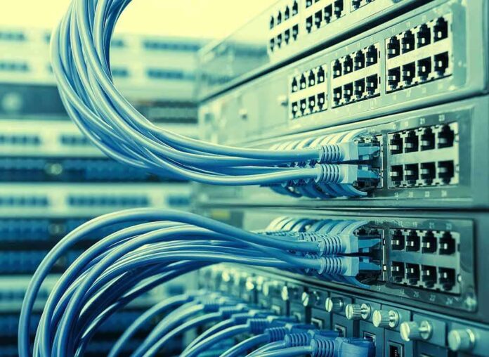 Network switches with blue Ethernet cables
