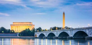 Arlington Memorial Bridge with Lincoln Memorial and Washington Monument at dusk