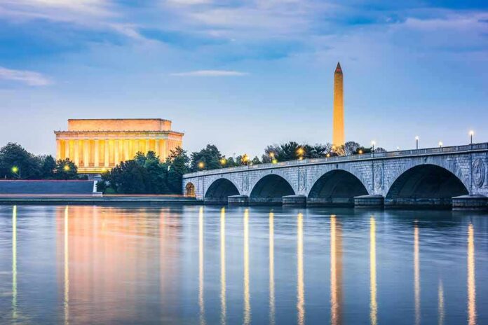 Arlington Memorial Bridge with Lincoln Memorial and Washington Monument at dusk
