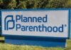 Planned Parenthood outdoor sign with blue logo