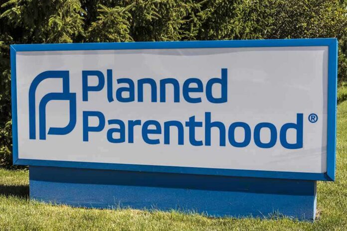 Planned Parenthood outdoor sign with blue logo