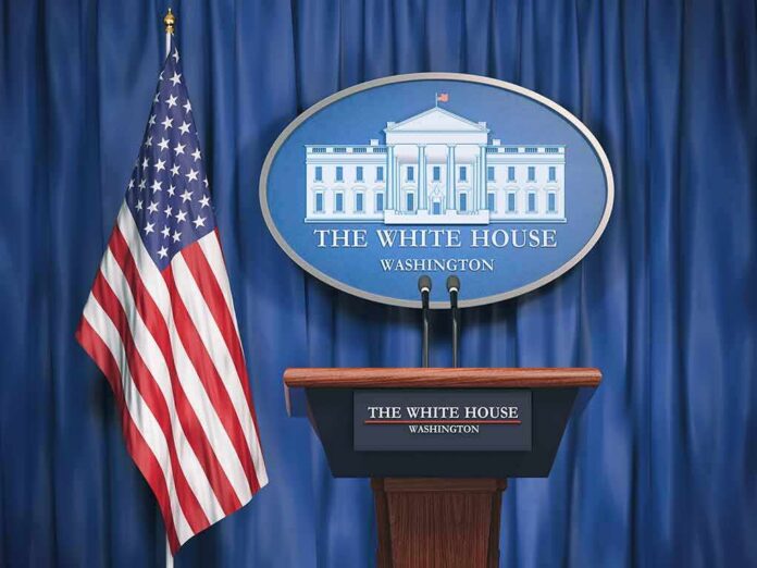 shutterstock_1175844628-2 White House press briefing podium and US flag