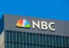 NBC logo on a modern office building facade