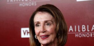 Pelosi’s Latest Stock Disclosure Raises Questions woman in navy lace dress on red carpet
