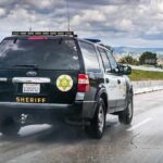 Malibu Scare: Harris Home Breached? Sheriff SUV driving on a highway