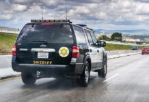 Malibu Scare: Harris Home Breached? Sheriff SUV driving on a highway
