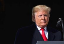 Trump Dares Iran: ‘Higher Level’ Coming Donald Trump at a podium with a microphone