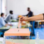 Vanishing Candidate Shocks Memphis Hand casting ballot into a box at a polling station