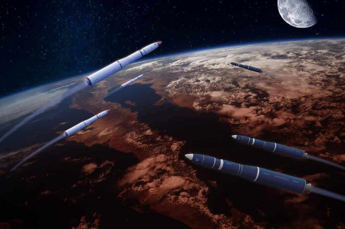 shutterstock_2060933069 Multiple rockets streak above Earth with the Moon in the background