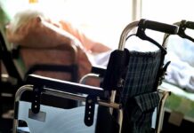 Elder Neglect Claim Turns Deadly wheelchair near a bed in a sunlit room