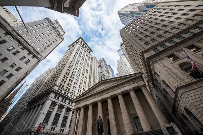 shutterstock_225380569 Skyscrapers and a neoclassical building with columns viewed from street level