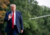 Trump Meets NYC Mayor Donald Trump walking outdoors and waving