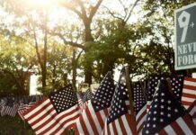 California Campus 9/11 Tribute Defaced American flags displayed outdoors at a memorial