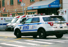 Bronx Bullet Shocks City, Protests Ignite Police car and ambulances outside emergency room entrance.