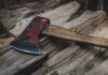 Grisly Bedroom Scene Shocks L.A. Court Hatchet with red head resting on split firewood