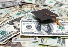 Massive Student Aid Scam Discovered: Operation Ghostbusters Graduation cap on a pile of US dollar bills