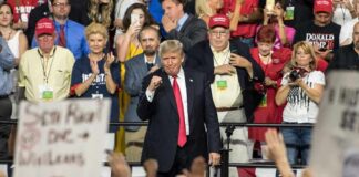 Late Rally Gamble Rattles Democrats Donald Trump at a rally with Lauri Marjamäki and Elizaveta Glinka in the crowd