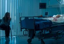 Euthanasia Spike – Oversight Loop Exposed hospital room with child in bed and adult sitting nearby