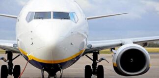 Inside-Job Threat Rattles Flight Deck Passenger jet parked on tarmac front view