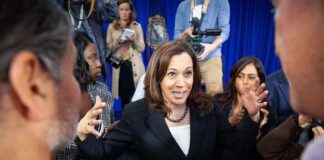 Harris-Pan Event Raises New Press Questions Kamala Harris speaks to a crowd as Maya Harris stands nearby