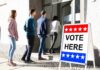 voters lining up at a polling place entrance