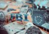 U.S. Arrest Rocks Canadian Massacre Case Hands typing on a laptop with digital cybersecurity graphics overlay