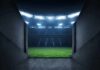 Stadium tunnel opening onto a brightly lit field