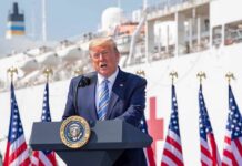 Cheap Diesel Unleashed – Prices Next? Donald Trump speaking at a podium with American flags and a ship in the background