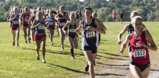 Walk-Off Protest Ignites Statewide Fight Courtney Bruce and Adelina Sotnikova running in a cross-country race with a large pack